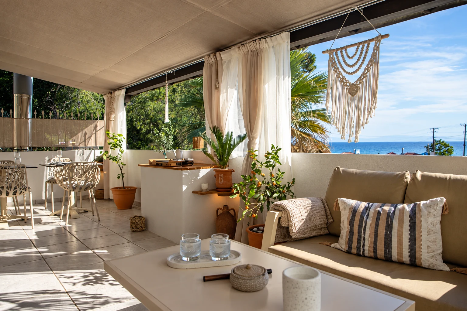The private sea-view terrace at Odyssey Seaview in Possidi, Greece
